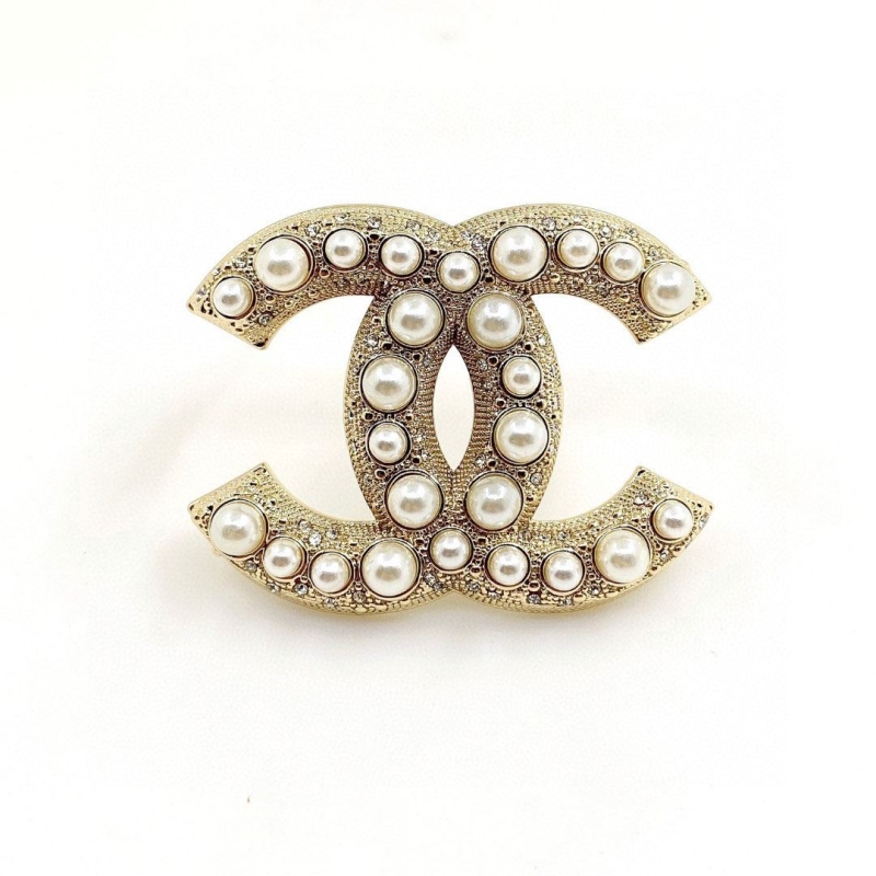Ch*el brooches